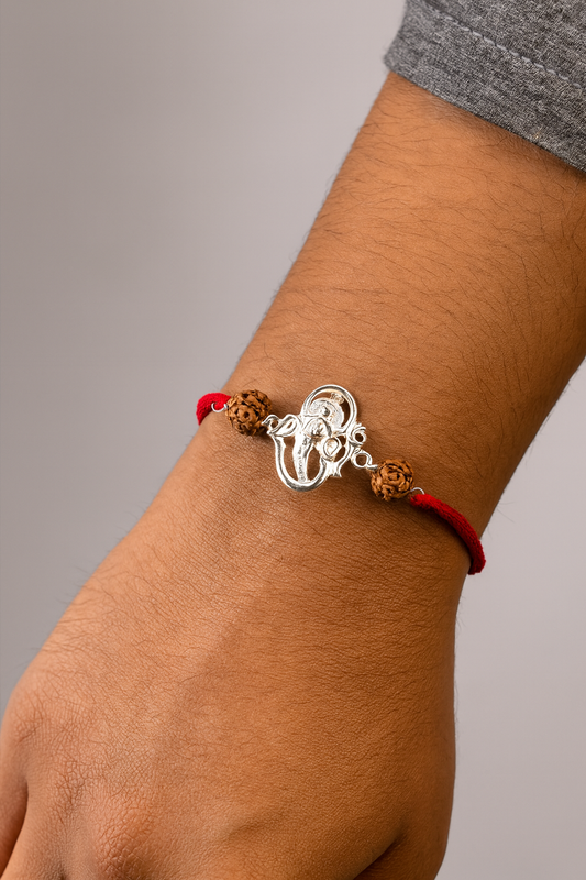 Pure silver lord ganesh design rakhi